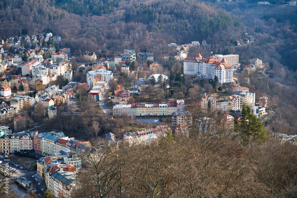 Karlovy Vary, Czech Republic - March 04, 2019: Aerial view of the city and the mountains on the horizon