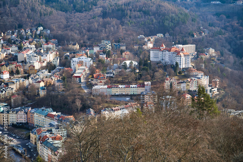 Karlovy Vary, Czech Republic - March 04, 2019: Aerial view of the city and the mountains on the horizon