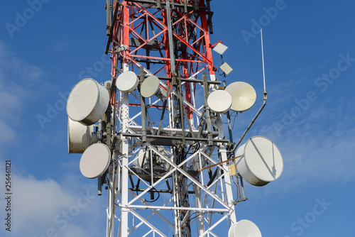 cellular antennas against a blue sky