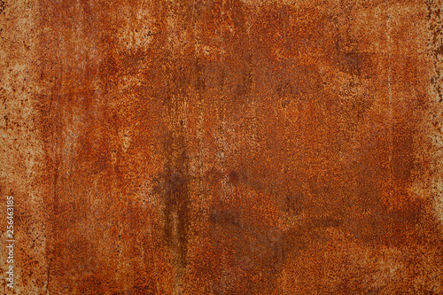 Grunge rusted metal texture. Rusty corrosion and oxidized background. Worn metallic iron panel. Abandoned design wall. Copper bar.