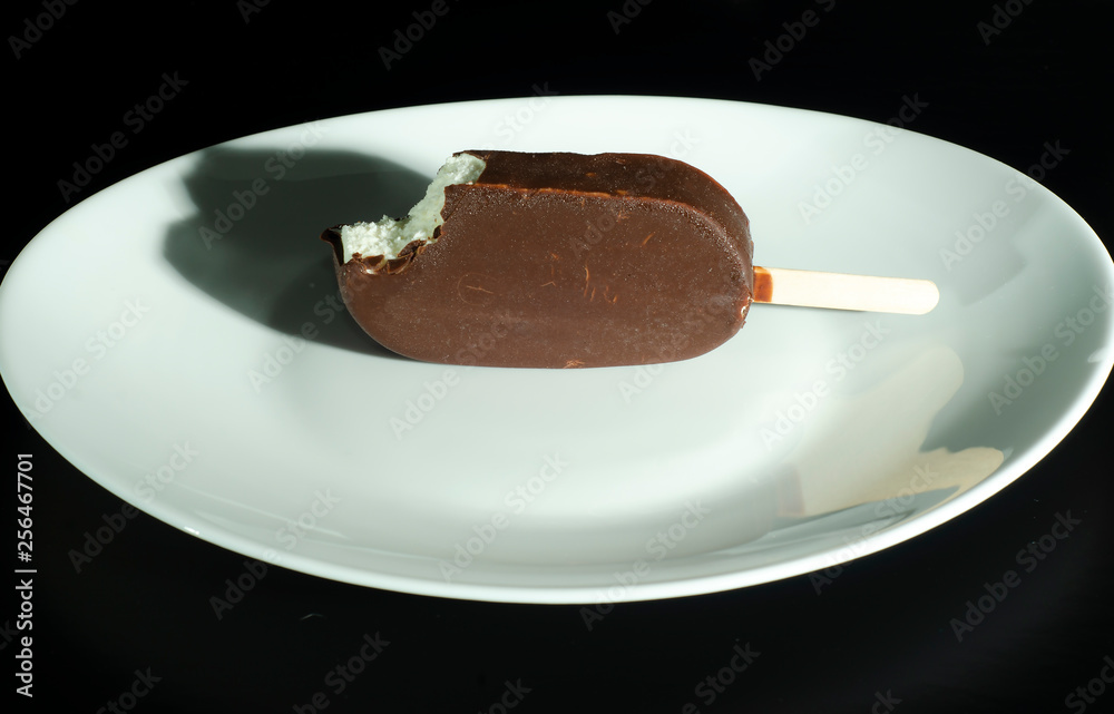 Fototapeta premium Eskimo. Sundae in chocolate. Ice cream on a stick. Cold dessert