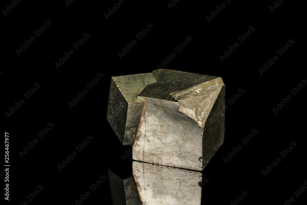 Macro mineral stone Pyrite on a black background Macro mineral stone Pyrite on a black background