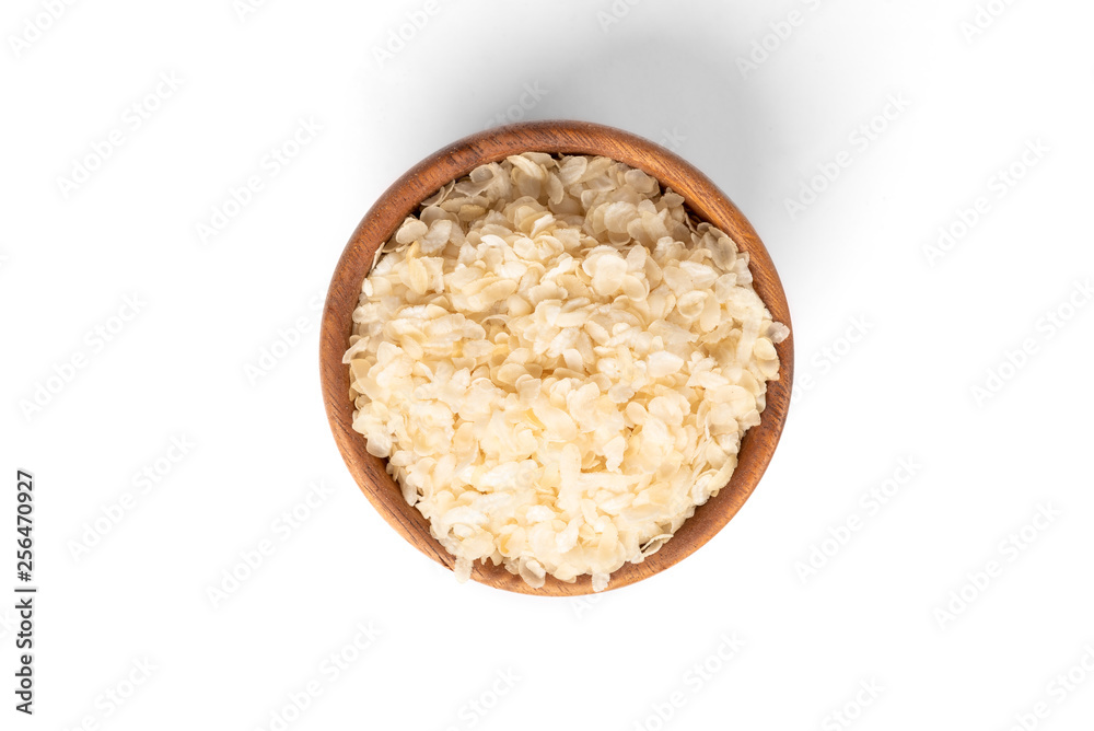Rice flakes isolated on white background. Rice flakes isolated on white background.