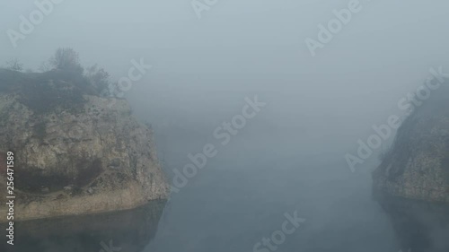 Wallpaper Mural Amazing early morning mist in canyon over lake with blue water  Torontodigital.ca
