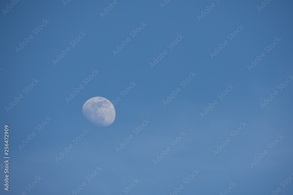 moon and blue sky as background moon and blue sky as background