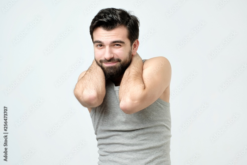 Young hispanic man with beard is feeling guilty. Young hispanic man with beard is feeling guilty.