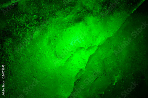 Dark green emerald abstract background. Illuminated and translucent. photo