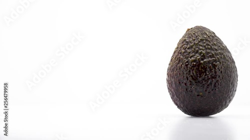 Whole Avocado Frame Right in 4k 3840 x 2160 Rotating, Looping, 360 Degree Rotation on White Background