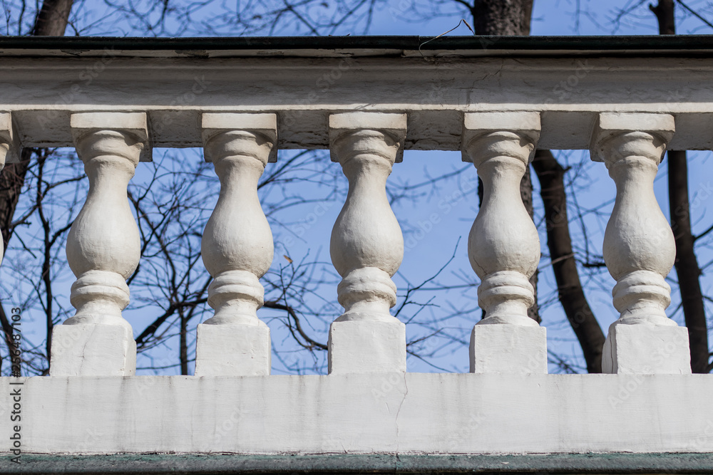 Fototapeta premium Old fence has columns as ornament in the park