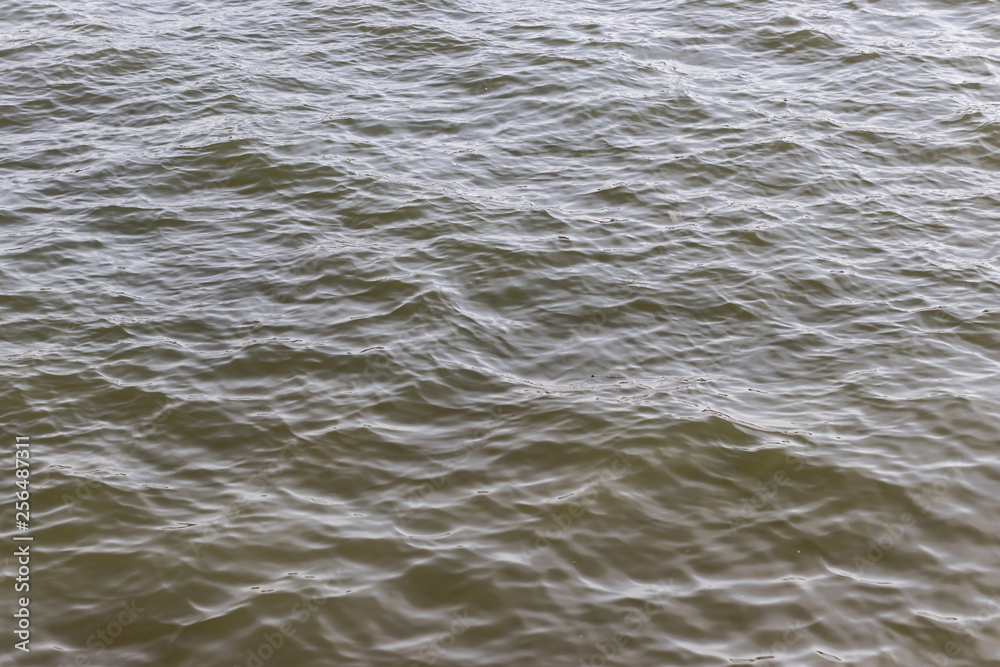 Rippling water with sky reflection background pattern texture Rippling water with sky reflection background pattern texture