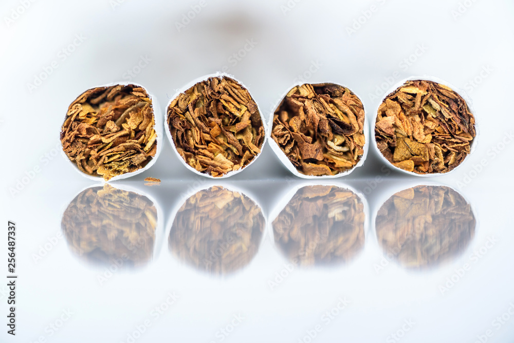 Cigarettes close up on a white background. Cigarettes close up on a white background.