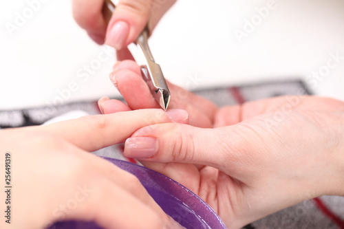 female nail manicure processing