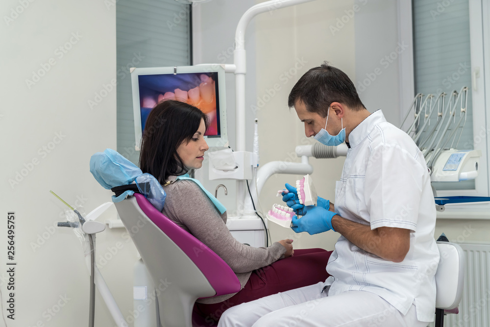 Doctor and patient talking about mouth hygiene Doctor and patient talking about mouth hygiene