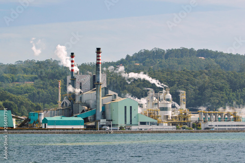 Paper mill factory near a sea loch photo