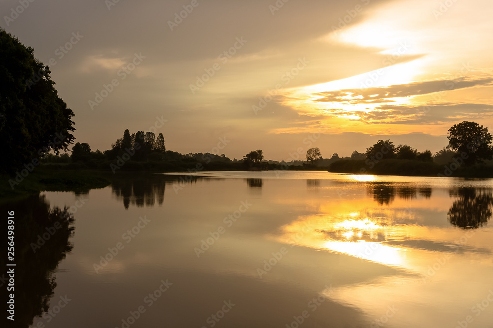 Thailand countryside landscape Light from the sun Reflect on the water at morning time
