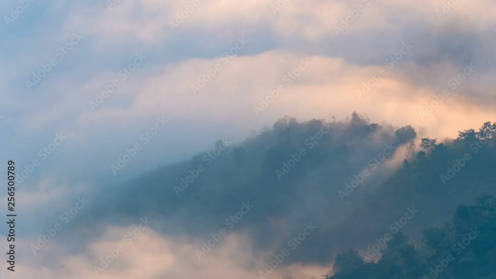 Fog moving covered mountain with sunlight, timelapse Fog moving covered mountain with sunlight, timelapse