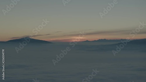 Wallpaper Mural Aerial drone view of sunrise in snowy mountains over clouds and white trees in winter  Torontodigital.ca