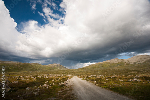 landscape with road and stormy clouds