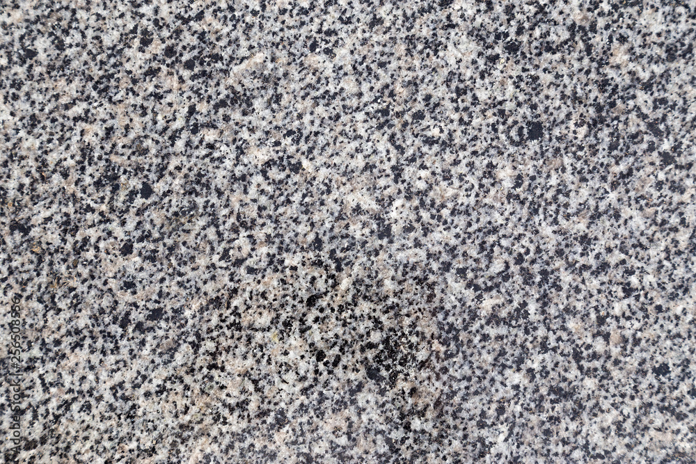 Gray granite stone background. Aged rough rock material texture top view - obrazy, fototapety, plakaty 