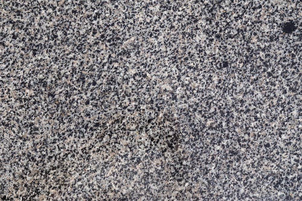 Grey marble texture shot through with subtle white veining (Natural pattern for backdrop or background, Can also be used for create surface effect to architectural slab, ceramic floor and wall tiles) Grey marble texture shot through with subtle white veining (Natural pattern for backdrop or background, Can also be used for create surface effect to architectural slab, ceramic floor and wall tiles)
