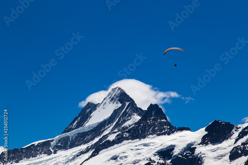 Paraglider above Peak
