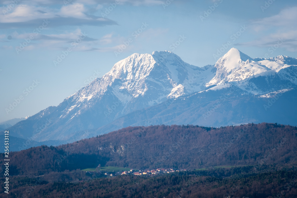 Village Rasica and mountain range Kamnik–Savinja Alps with Kocna, Grintovec