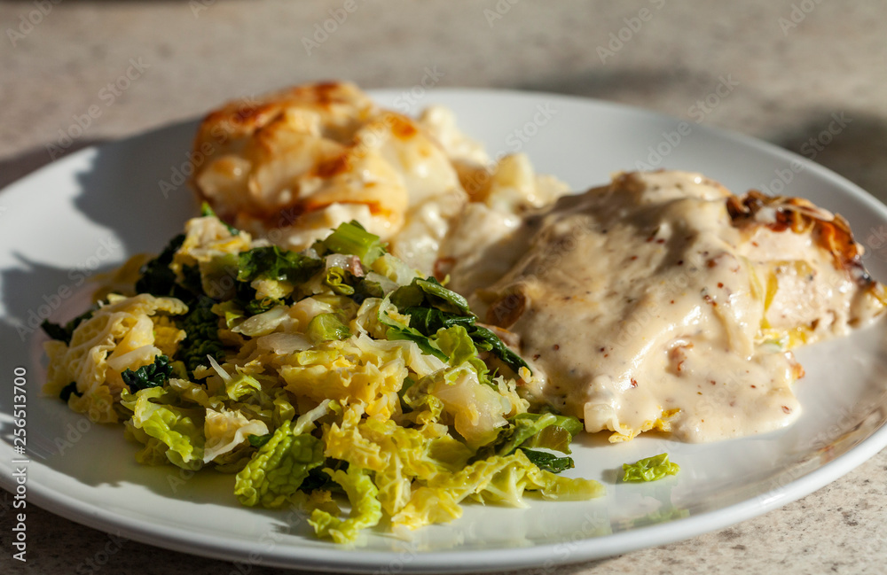 Chicken with leeks in a white wine sauce