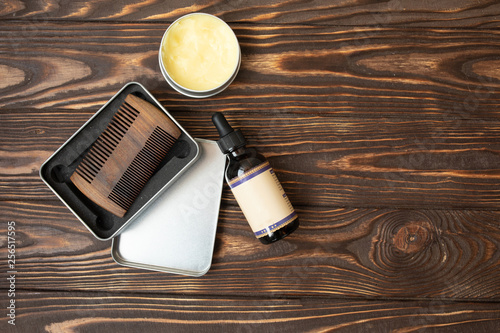 Fotografie Old vintage barber shop tool on an old wooden background