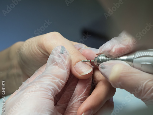 Hardware manicure. Treatment of nail cutters.