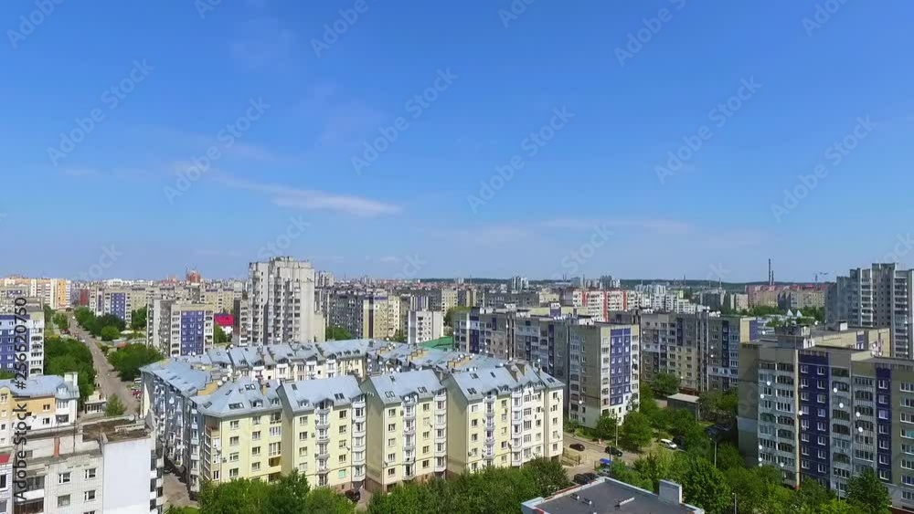 Big city from bird's eye view. Landscape with buildings covered by drone. Footage of urban city. Day, summertime. Outdoors. Sunny day. Blue sky. Ukraine. Big city from bird's eye view. Landscape with buildings covered by drone. Footage of urban city. Day, summertime. Outdoors. Sunny day. Blue sky. Ukraine.