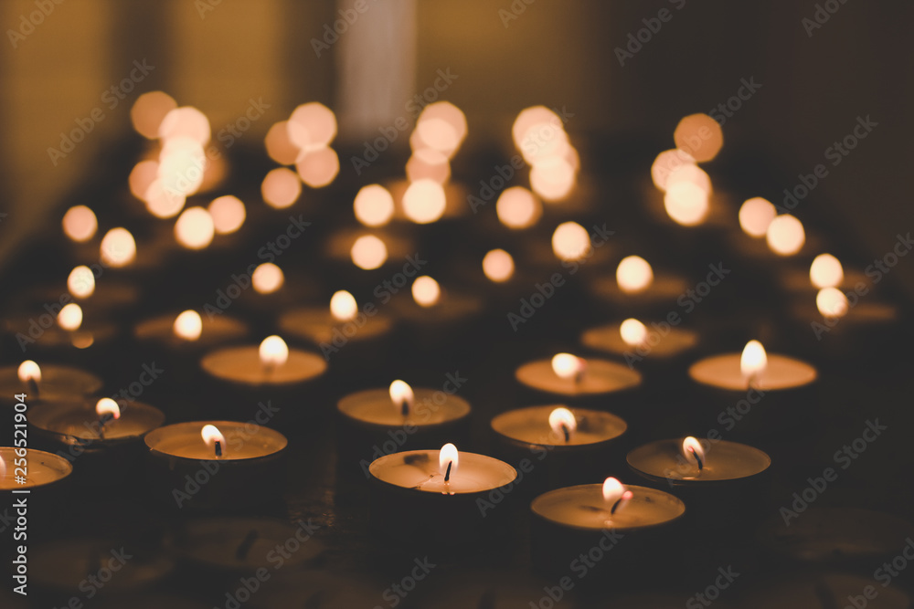 candle soft focus object inside church temple religion building in darkness lighting environment with bokeh effect background