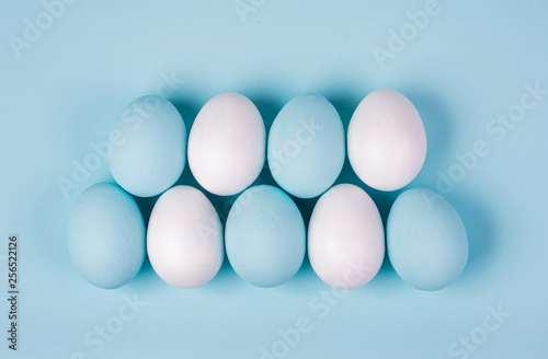 Hand painted easter eggs on clean neutral background. Spring and Easter holiday concept.