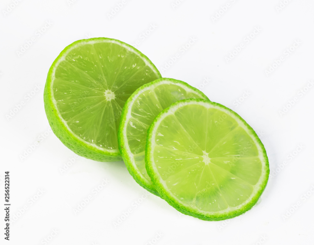 a slice of lime, isolated on white background a slice of lime, isolated on white background