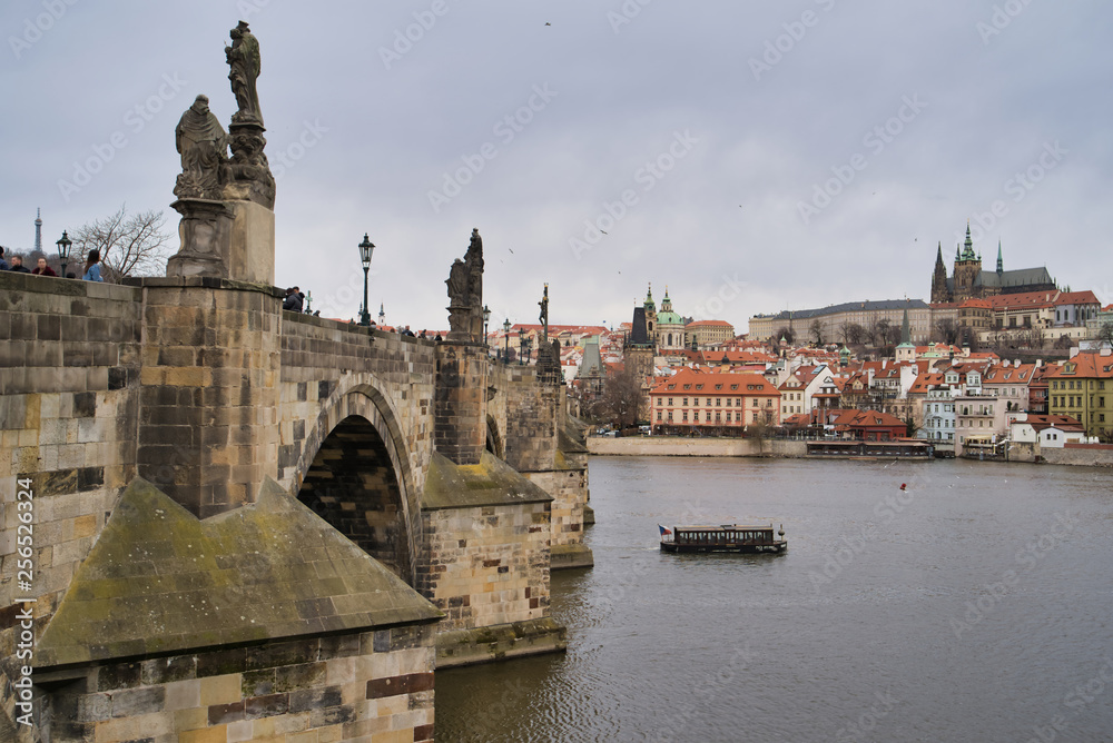 Prague, Czech Republic - March 04, 2019: Charles Bridge over the Vltava River. View of the Old Town - the historic district of Prague