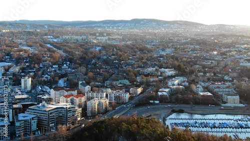 Aerial slow footage towards Skoyen and Frogner, e18 highway areas in Oslo, Norway at sunrise in spring 2019 photo