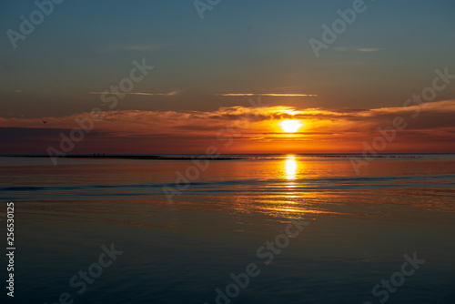 calm sunset with no wind on the lake