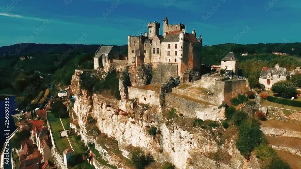 Beautiful ancient castle in France. The best view of the royal castle and the river Dordogne. Beautiful village and fortress. Beautiful ancient castle in France. The best view of the royal castle and the river Dordogne. Beautiful village and fortress.