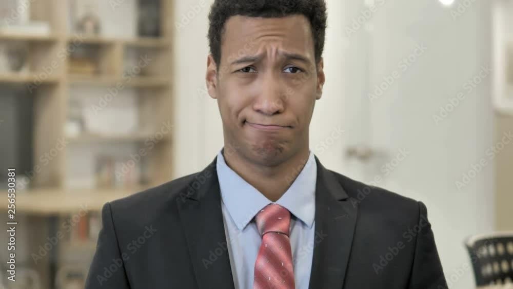 African Businessman Shaking Head to Reject African Businessman Shaking Head to Reject
