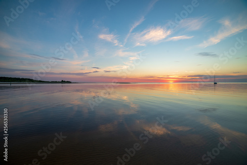 calm sunset with no wind on the lake