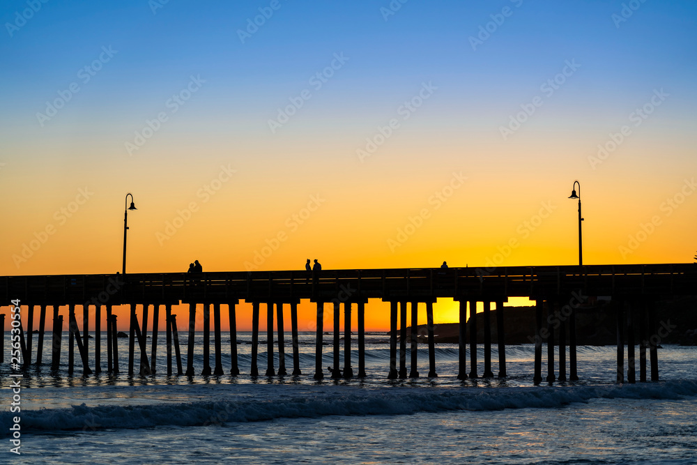 Orange and Blue Sunset at Beach and Pier 
