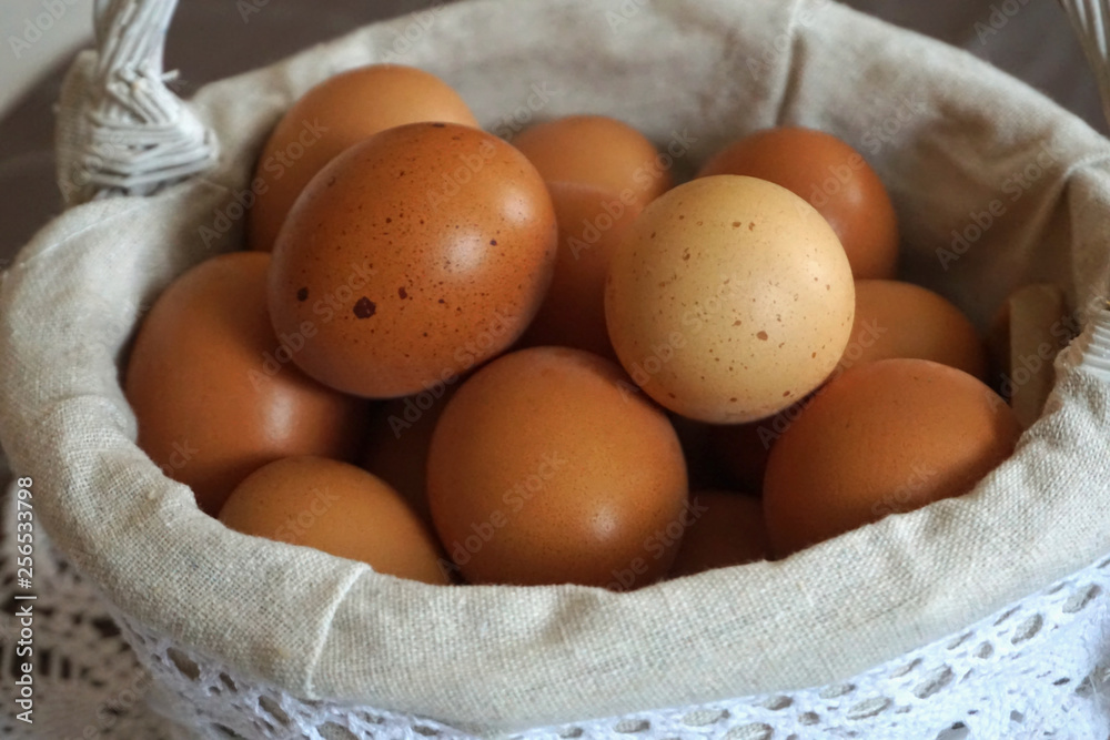 Fresh chicken eggs in basket, close up Fresh chicken eggs in basket, close up