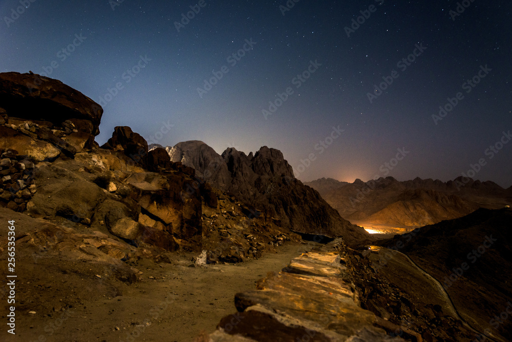 night landscape, bald mountains against a starry sky