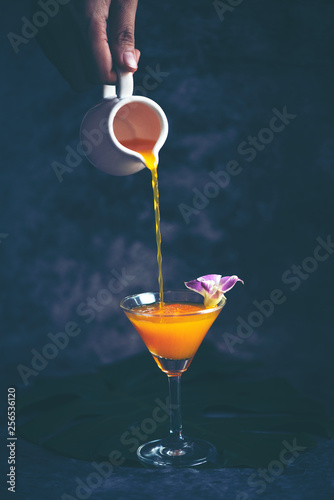 Pour the orange juice into ...