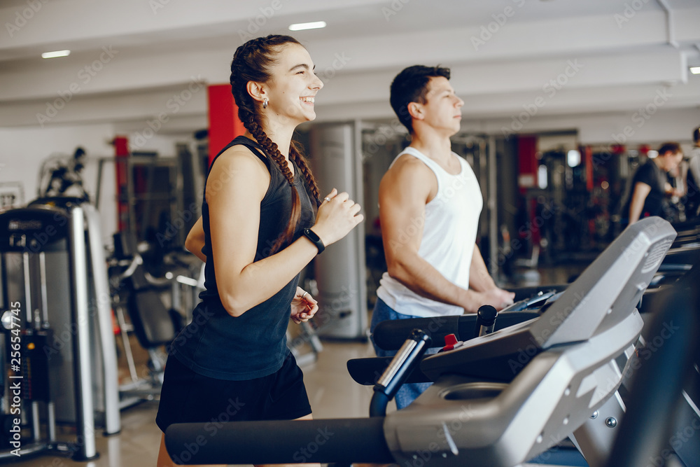 couple in a gym couple in a gym