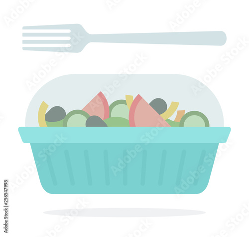 Salad in a plastic container with a fork