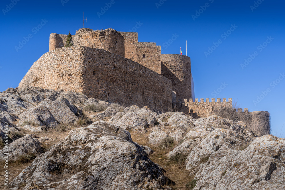 Consuegra castle and windmills aerial view with blue sky in La Mancha Spain famous Don Quixote site