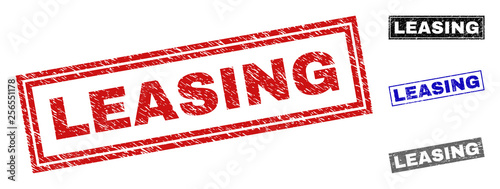 Grunge LEASING rectangle stamp seals isolated on a white background. Rectangular seals with distress texture in red, blue, black and gray colors.