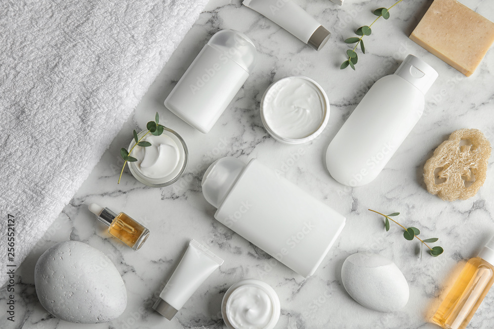 Flat lay composition with different body care products on marble background. Mockup for design Flat lay composition with different body care products on marble background. Mockup for design