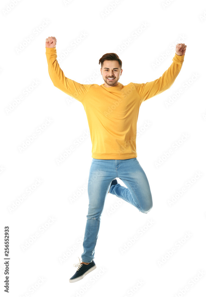 Full length portrait of happy handsome man jumping on white background Full length portrait of happy handsome man jumping on white background