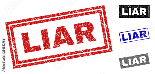 Grunge LIAR rectangle stamp seals isolated on a white background. Rectangular seals with grunge texture in red, blue, black and grey colors.